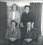 Inez with her parents and brother.  